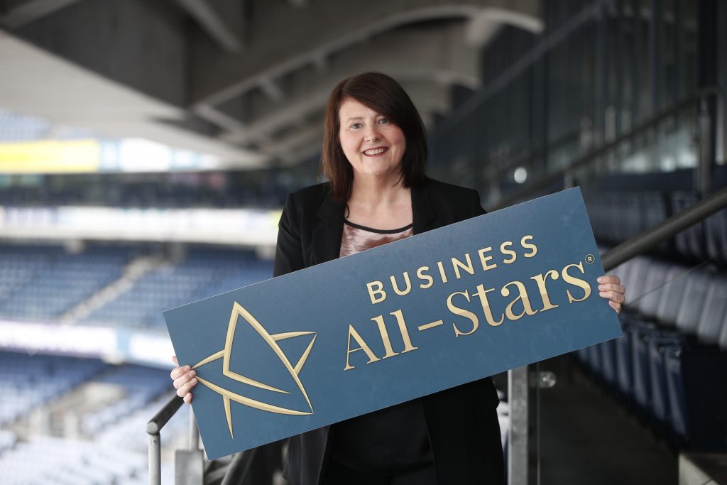 Ita Leyden Holding Business All-Stars Sign